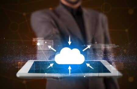 Businessman holding tablet with cloud concept 2026 03 26 01 27 50 utc